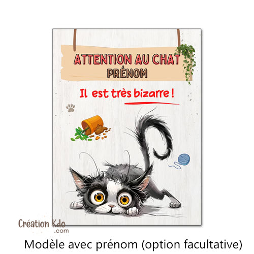 Plaque humour Attention au chat il est très bizarre (pelage noir et blanc) Panneau